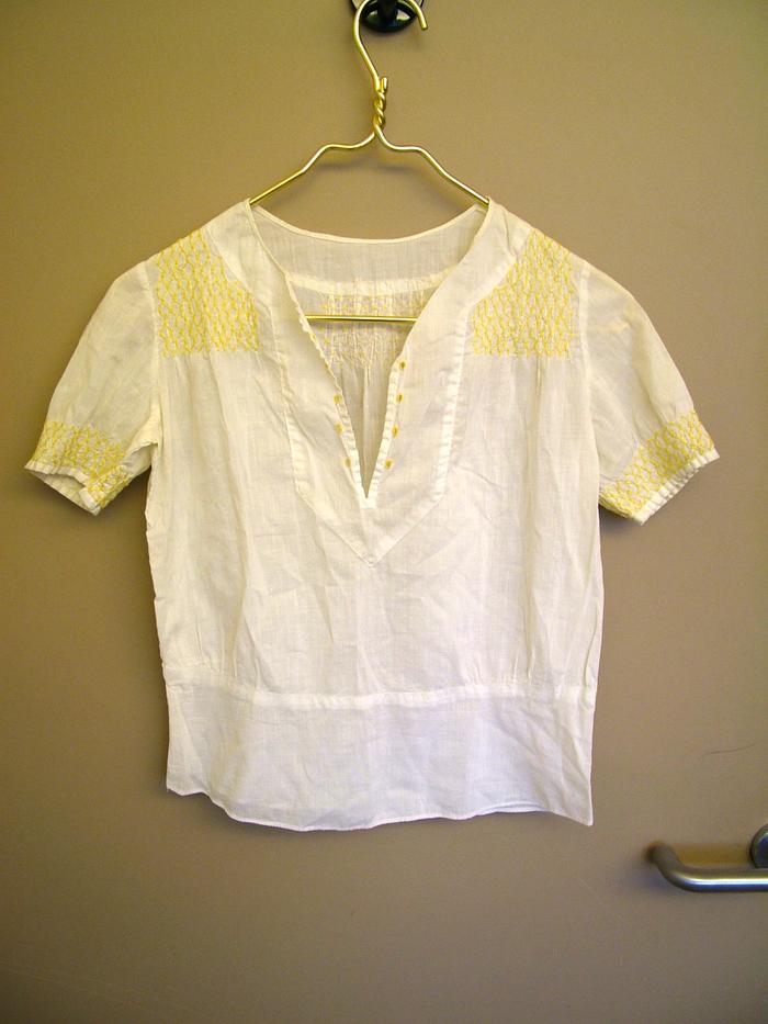 Woman's Blouse With Yellow Embroidery And Smocking