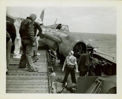 Photograph, Crashed FM2 On the port side (looking aft) of catwalk aboard U.S.S. Rudyerd Bay (CVE #81 -109)