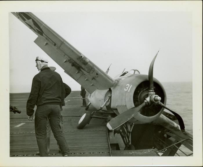 Photograph,  Crashed FM2 #16586 aboard the U.S.S. Rudyerd Bay