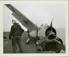 Photograph,  Crashed FM2 #16586 aboard the U.S.S. Rudyerd Bay