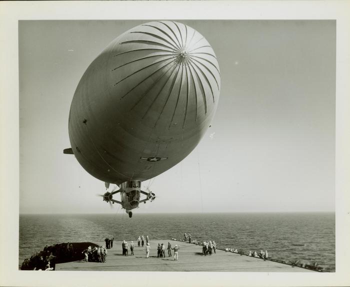 Photograph, Landing of a U.S. Navy Blimp on Flight Deck of U.S. S. Rudyerd Bay