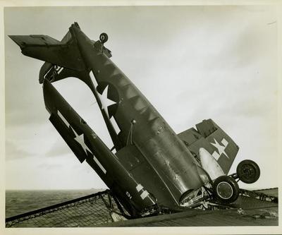 Photograph, Crashed aircraft aboard U.S.S. Rudyerd Bay