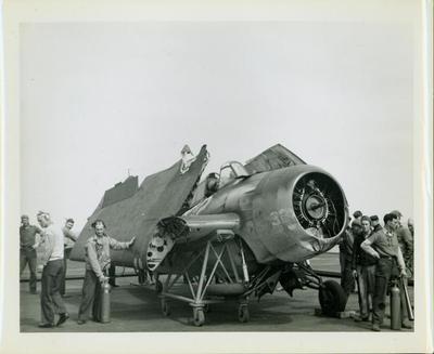 Photograph, Damaged Wildcat FM2 aboard U.S.S. Rudyerd Bay