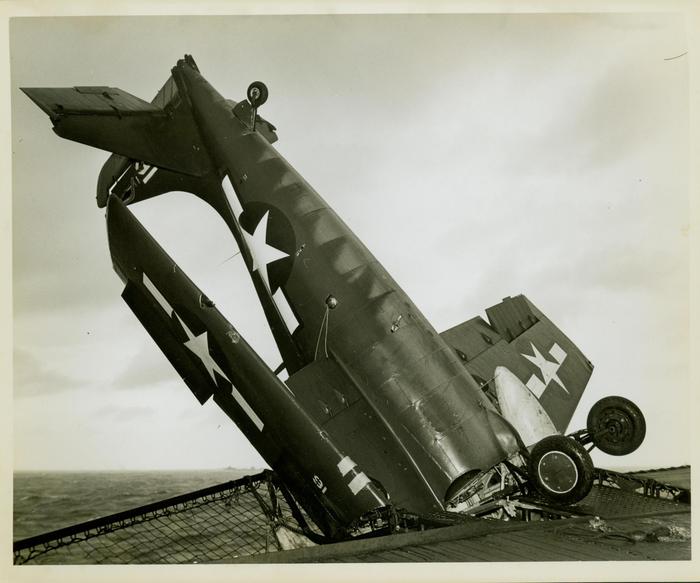 Photograph, Crashed aircraft aboard U.S.S. Rudyerd Bay