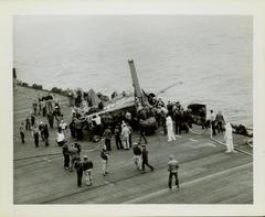 Photograph, Salvaging an FM2 aircraft aboard the U.S.S. Rudyerd Bay