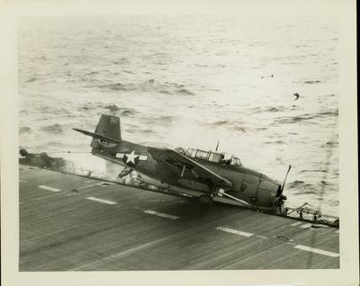 Photograph, Crash of TBM Naval aircraft piloted by Lt.(j.g.) Scannell aboard U.S.S. Rudyerd Bay
