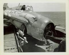 Photograph, Crashed FM2 aircraft aboard U.S.S. Rudyerd Bay