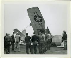 Photograph, Salvaging a crashed FM2 aircraft after a crash aboard the U.S.S. Rudyerd Bay