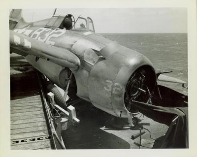 Photograph, Crashed FM2 aircraft aboard U.S.S. Rudyerd Bay