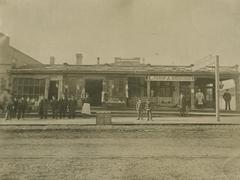 Photograph, Men Outside Storefront On Division And Fulton