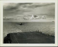 Photograph, Landing of an FM2 fighter aboard the U.S.S. Rudyerd Bay -Lt. (jg) Shane Hendershot, pilot