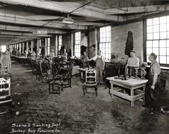 Photograph, Berkey and Gay Furniture Company, Men and Women Sanding and Staining Furniture