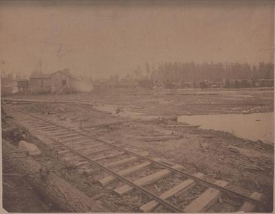 Photograph, Osterhout and Fox Lumber Company, View of Railroad Tracks and Lumber Yard