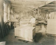 Photograph, Furniture Worker Operates Stroke Belt Sander
