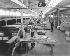 Photograph, Furniture Factory Scene, Lumber Stacks and Table Saws