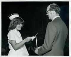 Photograph, Pine Rest Nurse lighting a Candle