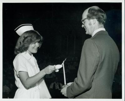 Photograph, Pine Rest Nurse lighting a Candle