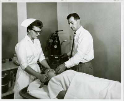 Photograph, Pine Rest Nurse performing Electro-Stimulus Therapy 