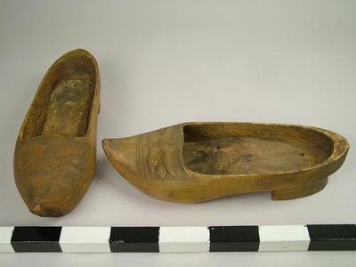 Wooden Shoes With Carved Design