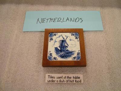 Delft Tile Hot Pad On Wood, Netherlands