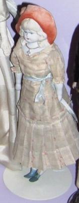 Parian Doll In Orange Bonnet