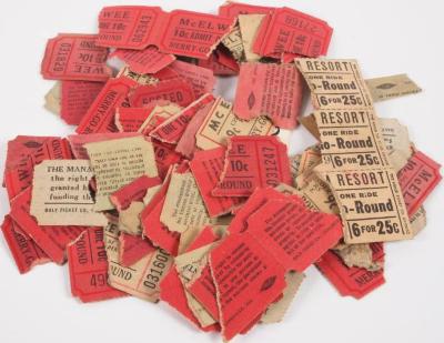 Various Colored Ticket Stubs Along With A Tab Of Cardboard That  Reads, 'kleines Theater'